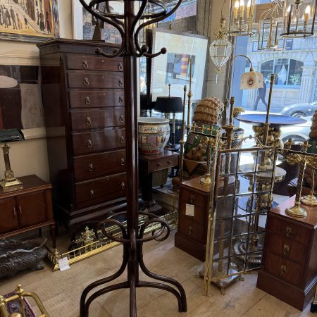 20th-century bentwood coat stand features scrolling hooks and a central finial